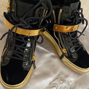 Black and Gold Giuseppe Zanotti high top sneakers. Womens Size 6